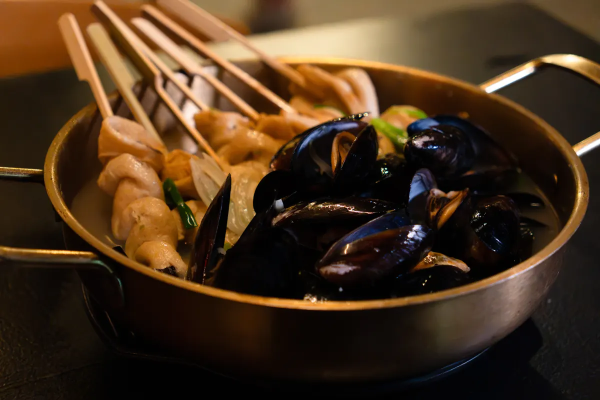 Mussel and fish cake soup